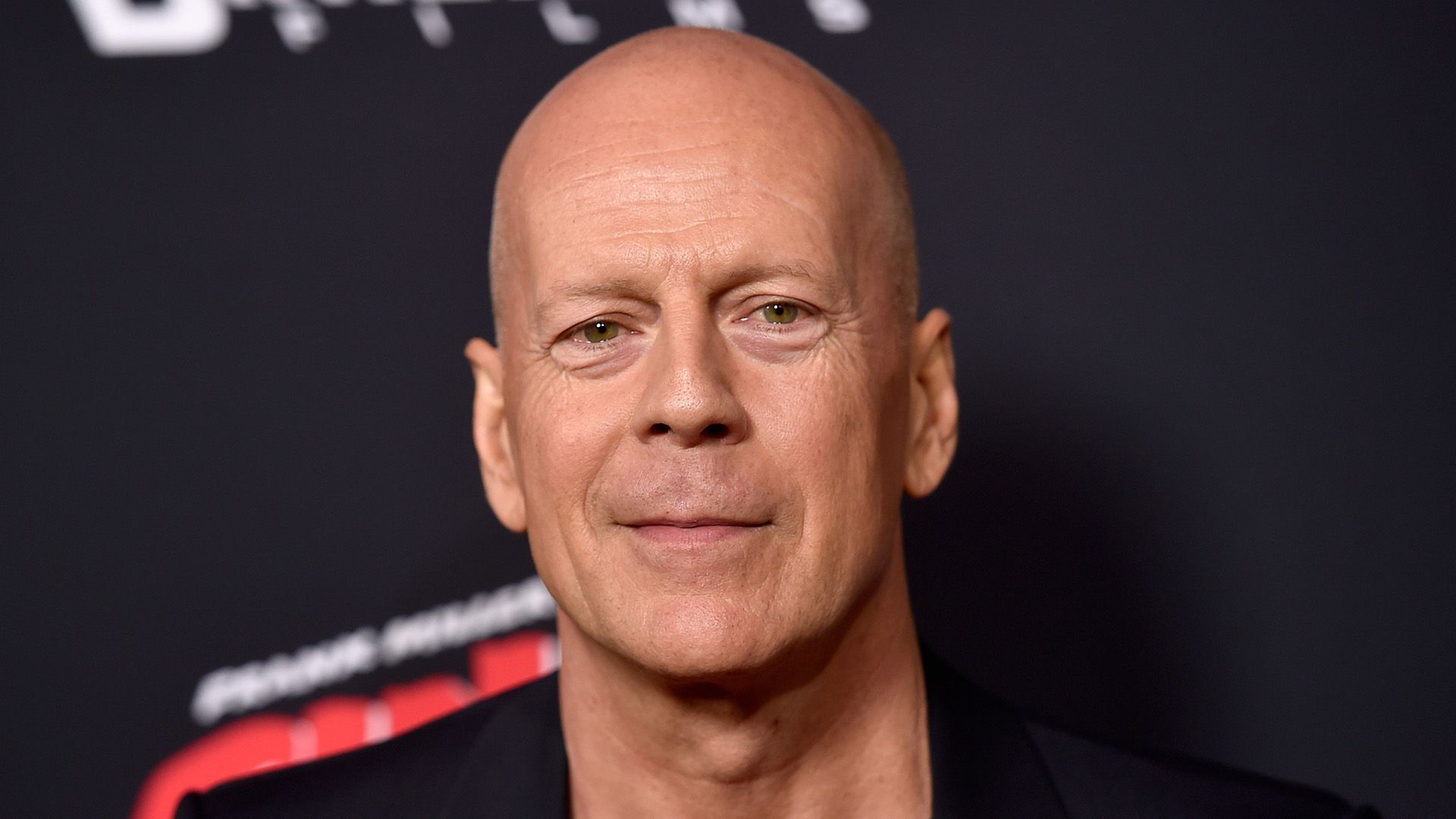 Actor Bruce Willis close-up on a black background