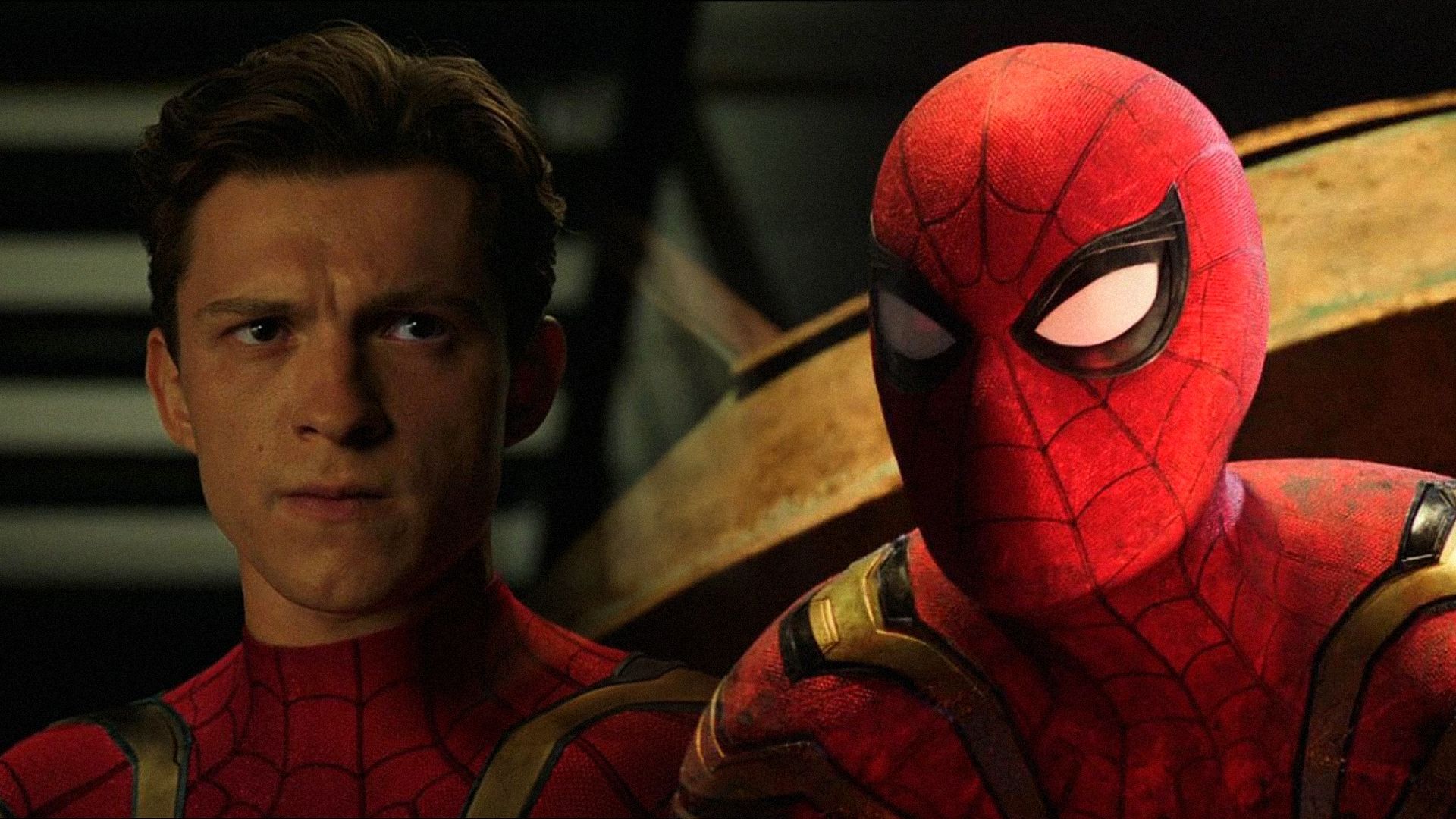 El actor Tom Holland con el traje de Spider-Man mira amenazadoramente hacia un lado contra un fondo oscuro